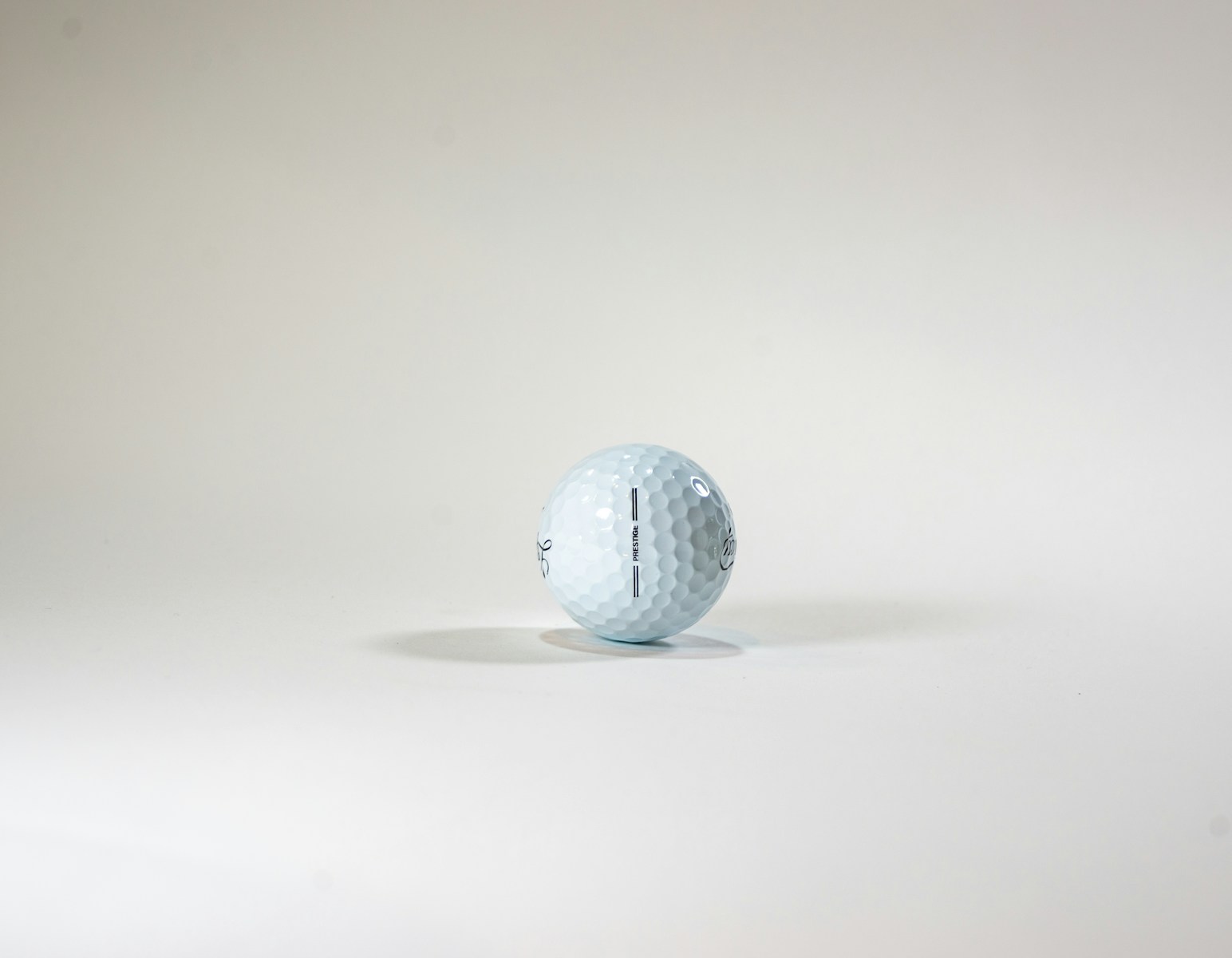 a golf ball sitting on top of a white table